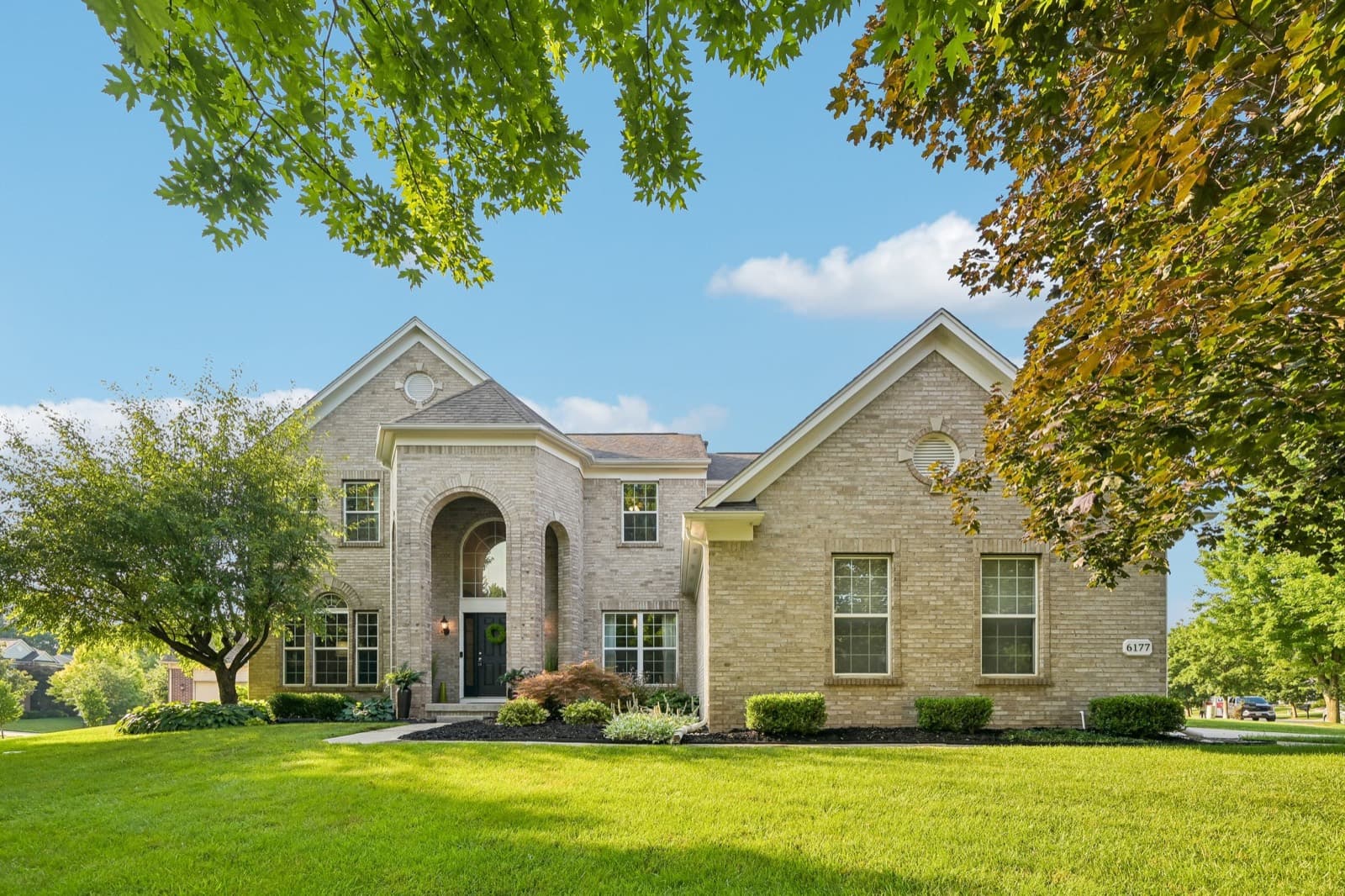 Brick front exterior with arched entry