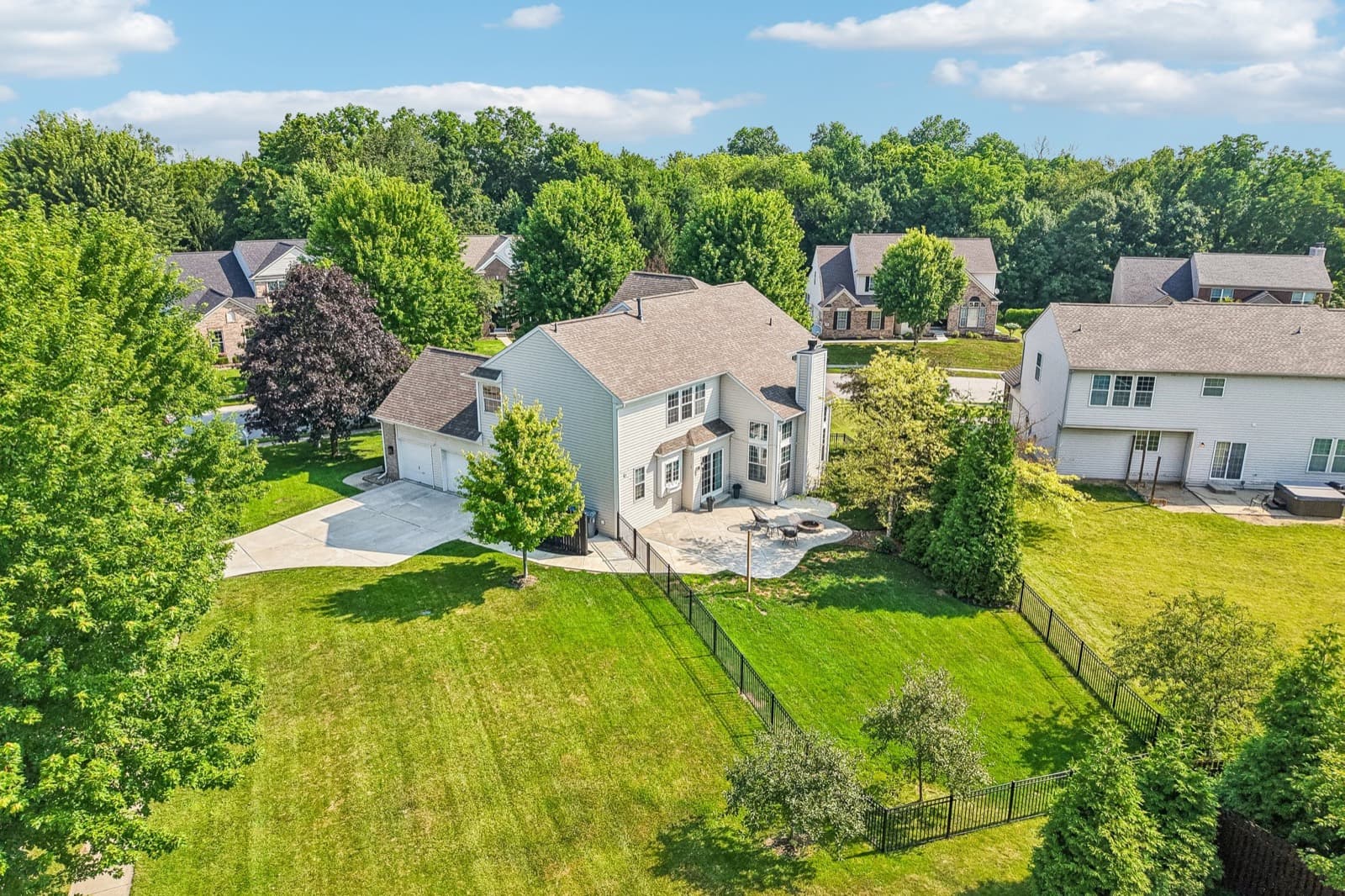 Aerial view of the fenced backyard